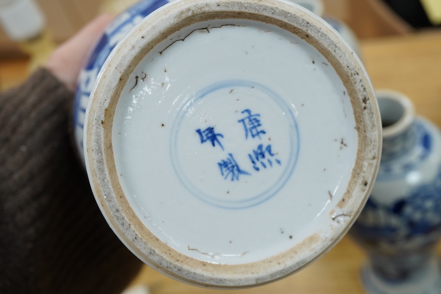 A pair of Chinese blue and white vases and a baluster jar and cover, largest 23cm high